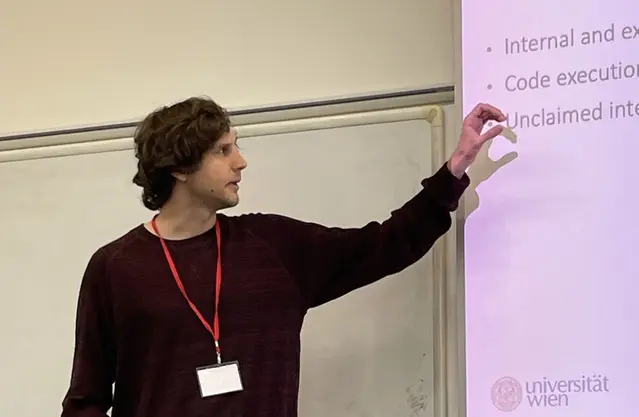 David Schmidt presenting at RAID 2026
